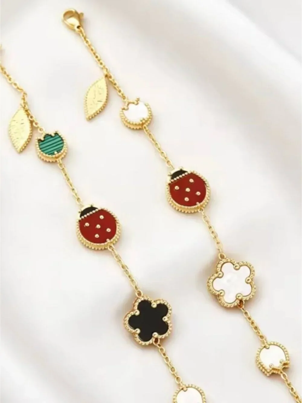 Luxury Gold-Tone Women’s Charm Necklace with Red, Black & Green Enamel Accents